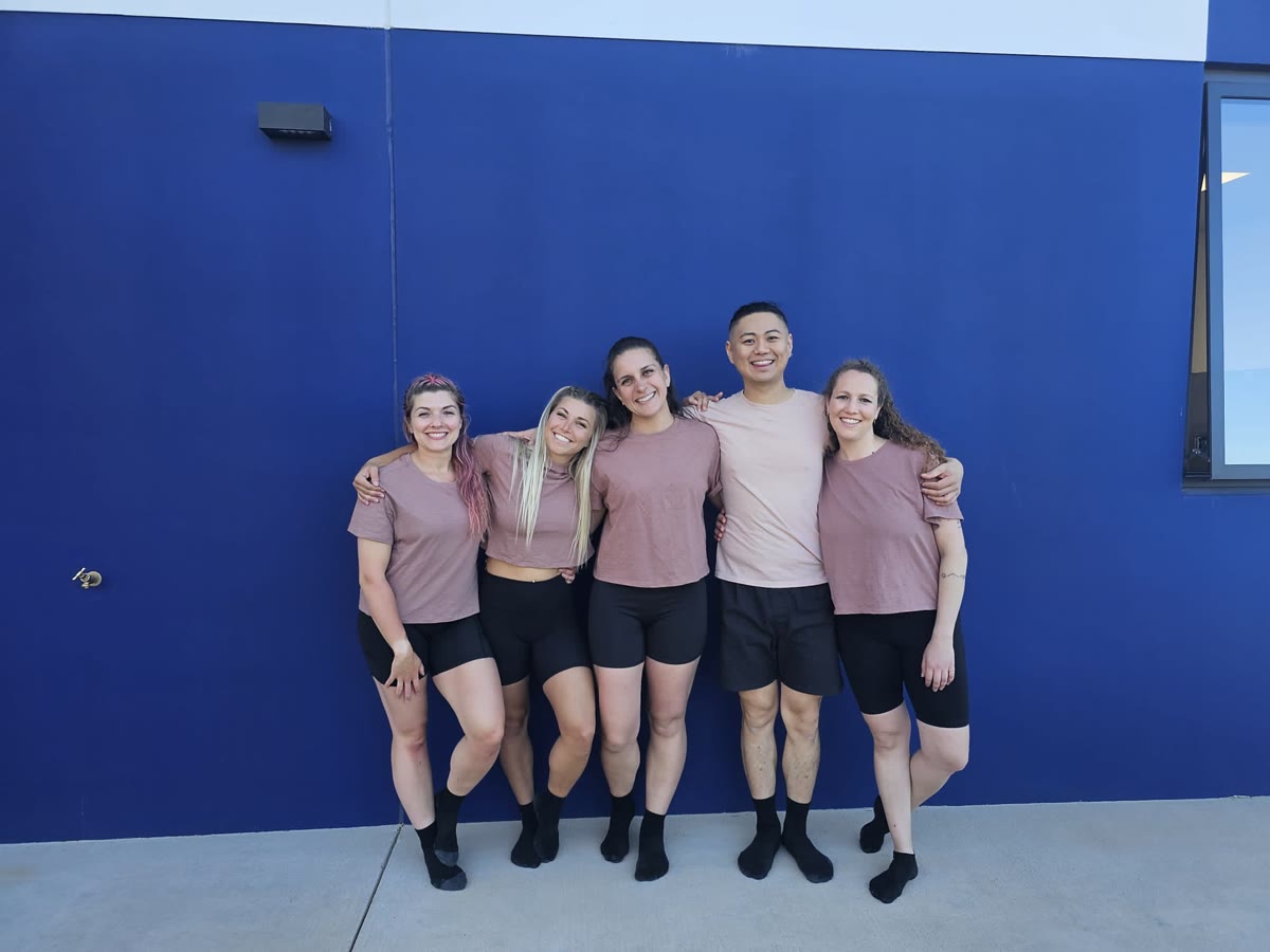 QTC crew in matching outfits